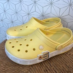 Walt Disney World X crocs yellow slides size 7W or 5M